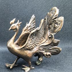 Phoenix figurine craft, a vintage home decor item.