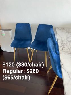 $120 (Reg $260) 4 Blue Dining Chairs