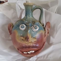 Vtg..Ugly Face..Handcarved Pottery Jug..Signed 