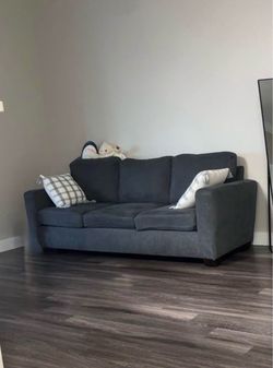 Beautiful dark grey sofa