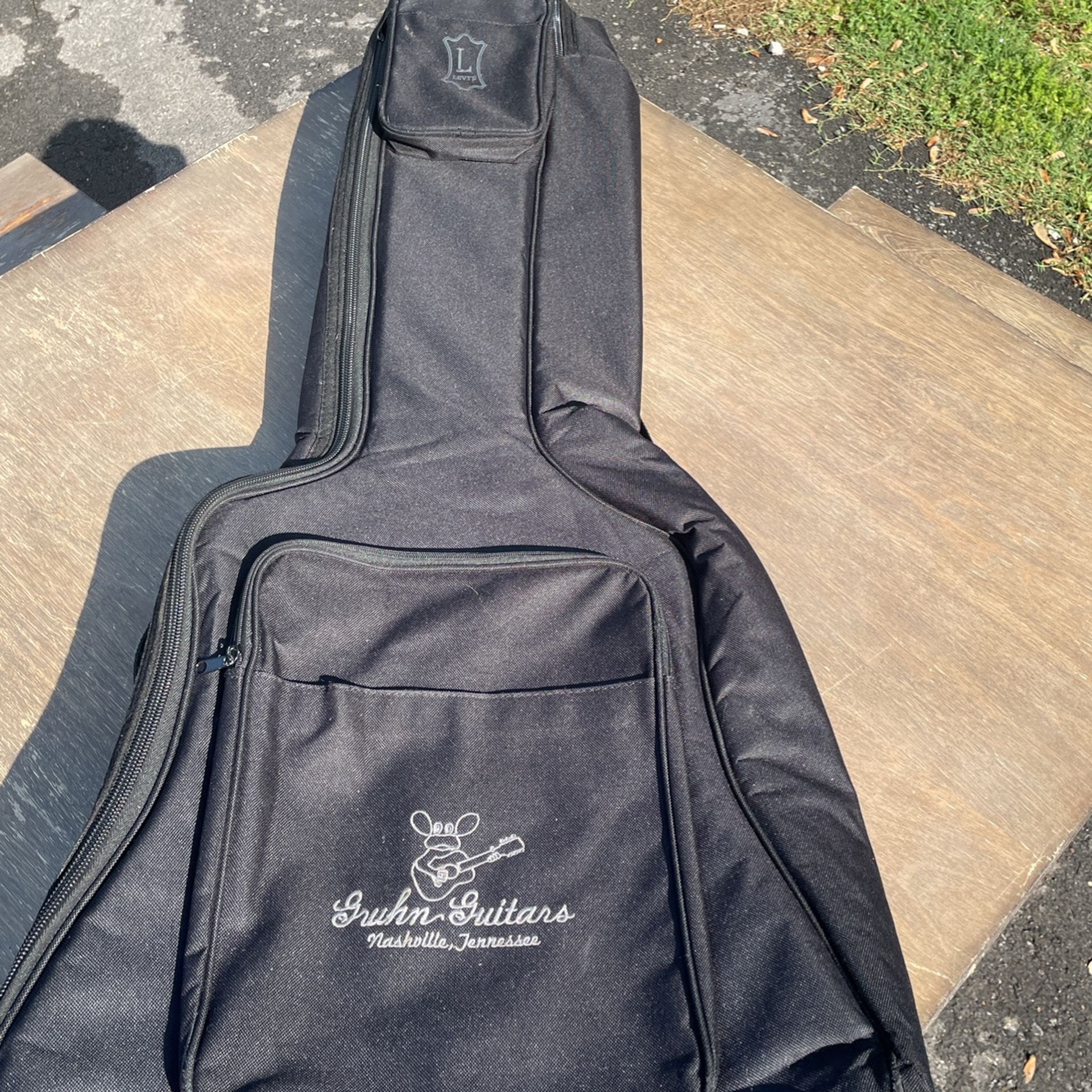 Levy’s Polyester Side Panel Two Pocket Nylon String Guitar Gig Bag - Black Write review Item ID: EM20CS Photo: levy's em20cs polyester side p