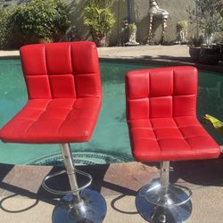 Pair of Orange/Red Quilted Adjustable Bar Stools