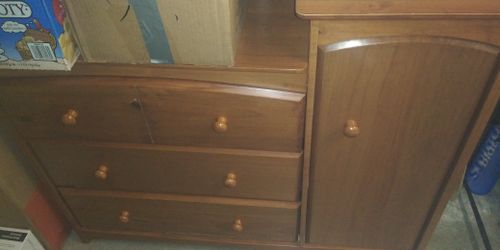 Storkcraft changing table with storage