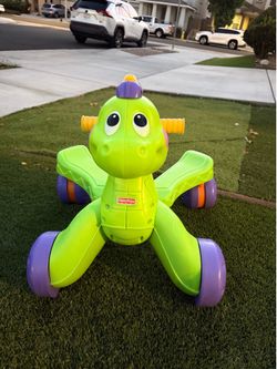 Fisher-Price Go-Baby-Go! Ride to stride Dino