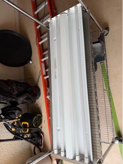 LED LIGHT FOR INDOOR OR GARAGE.  NICE WOOD EXTERIOR FRAME.
