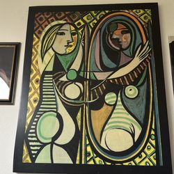 "Girl Before a Mirror" by Pablo Picasso