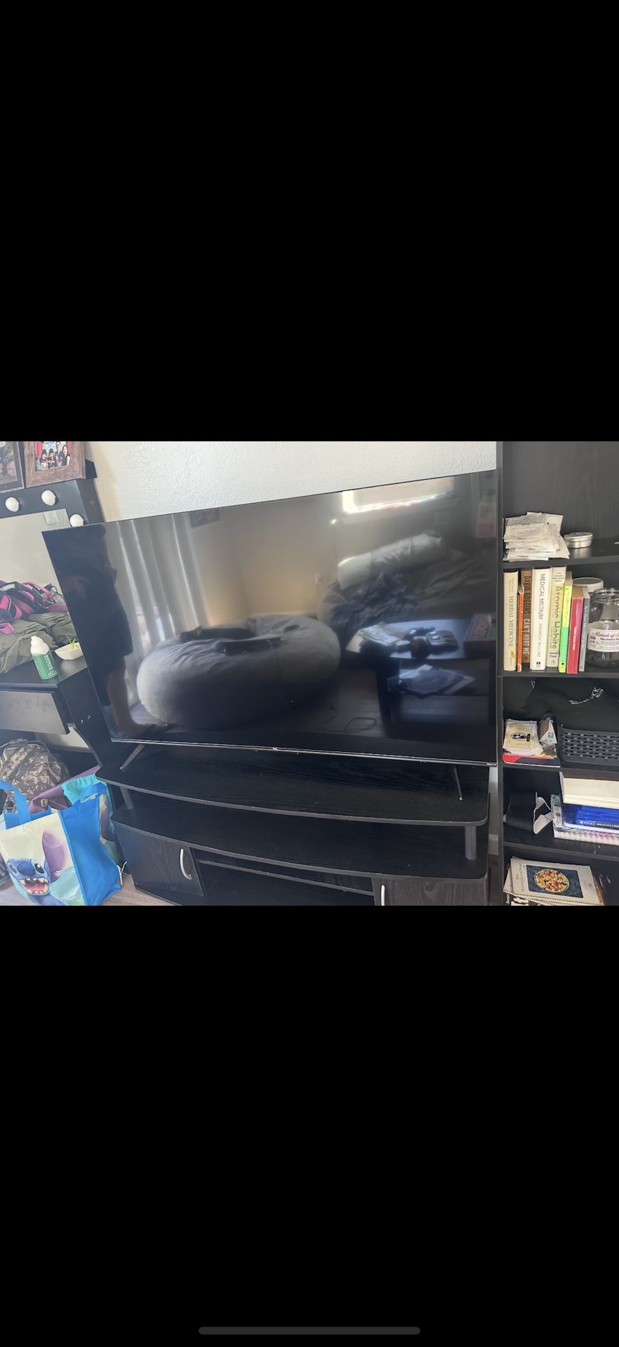 Flat Screen TV + Black TV Stand