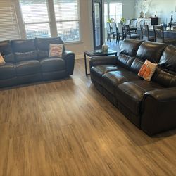 Two Leather Sofas  With Four End Chairs That Recline