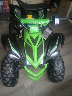 Yamaha Raptor with charger and batery