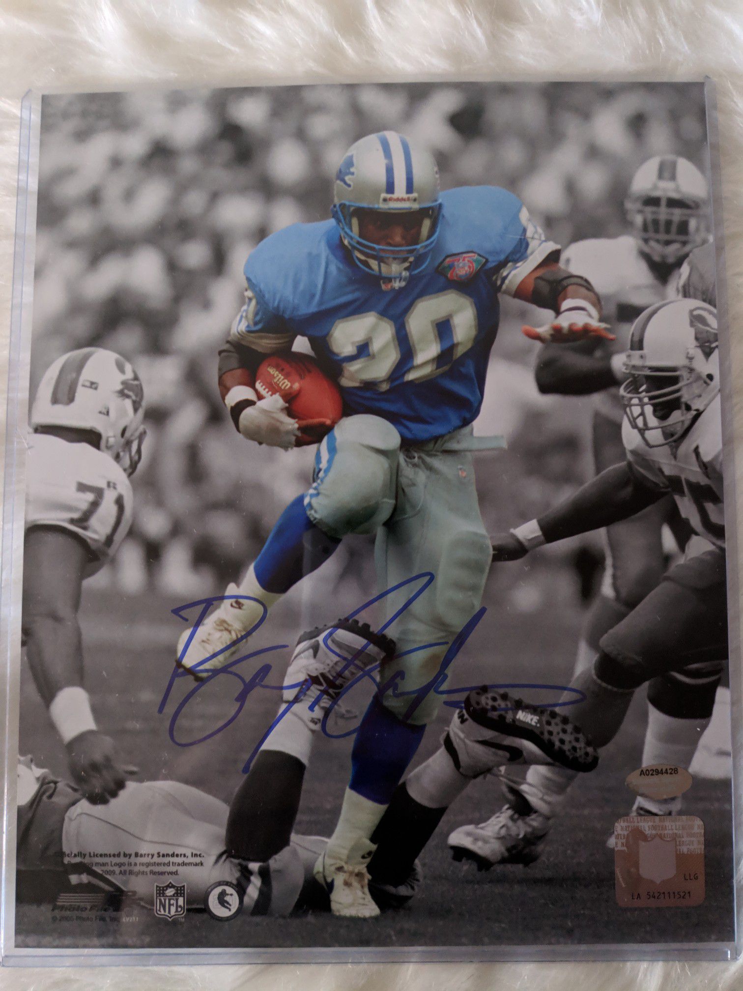 Barry Sanders Autographed Picture with COA