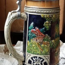 Antique German Stein. 11"heighth X 4.25" wide