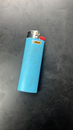 The baby blue color bic lighter with fluid and metal remove