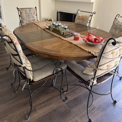 7 piece, wood and rod iron dining set with leaf