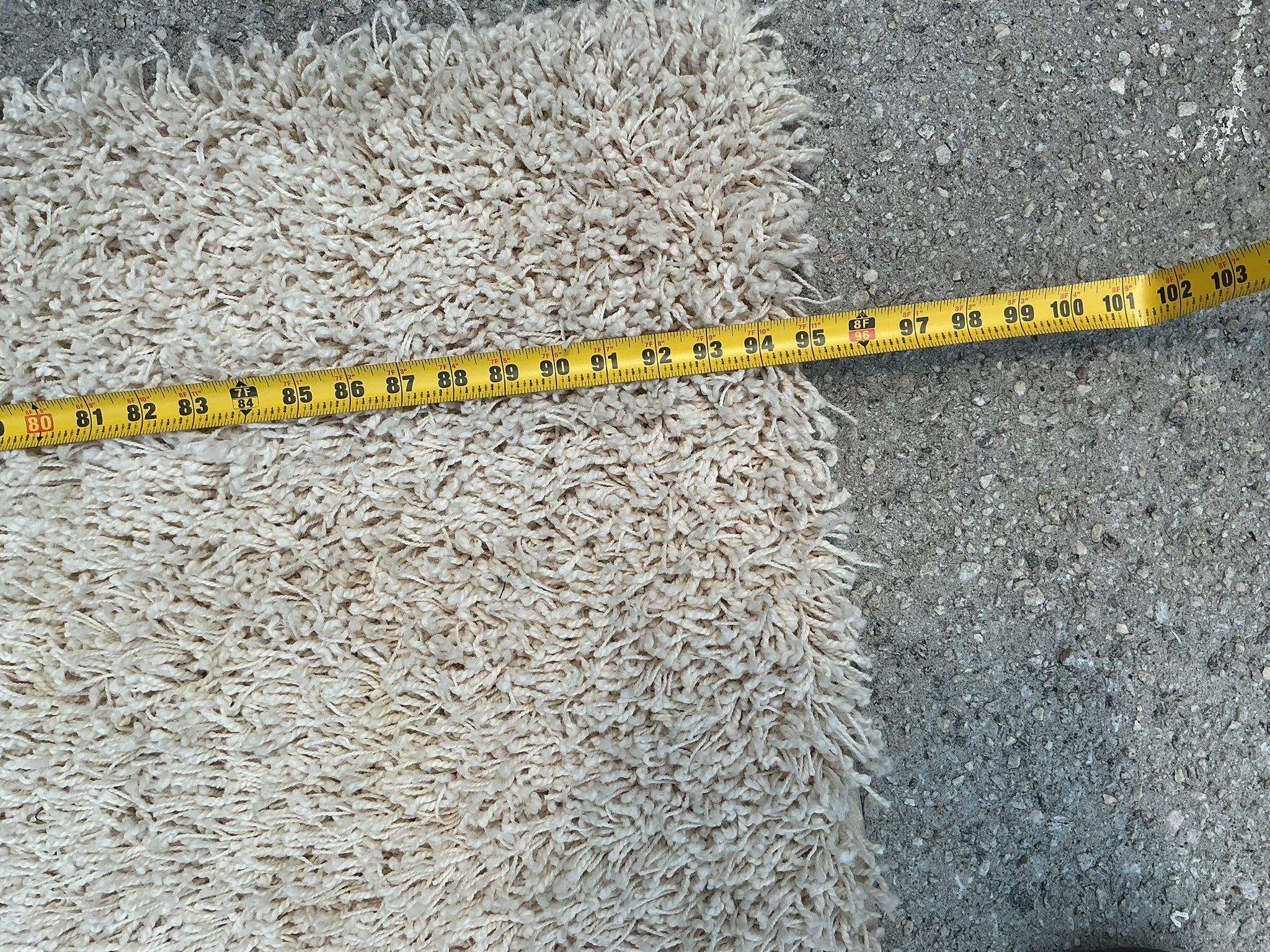 Large Cream Color Rug Needs Cleaning