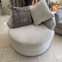 Ashley furniture swivel chair / stone