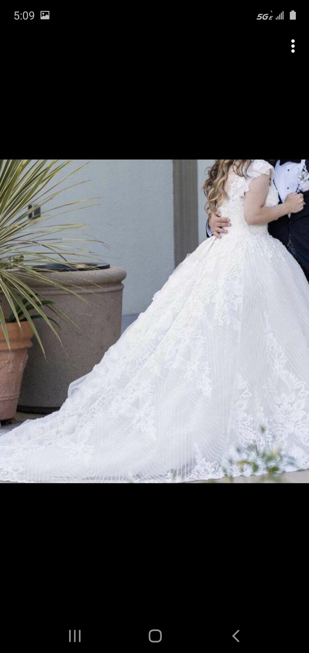 Size 42 euro wedding dress paid 3200