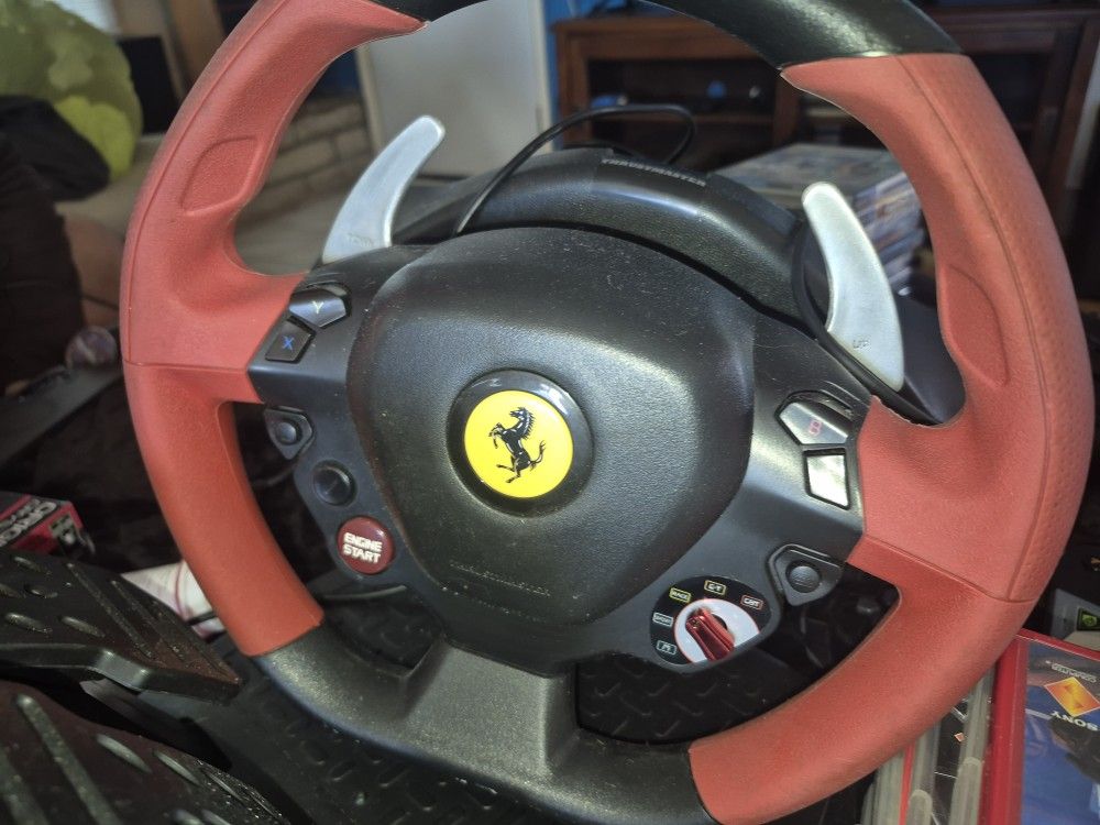 Miscellaneous PS3 Games + Racing Wheel And Pedals. Includes 3 Controllers, 2 Action Sticks And 2 Handheld Controllers 