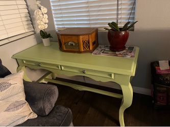 Green desk with wide drawers