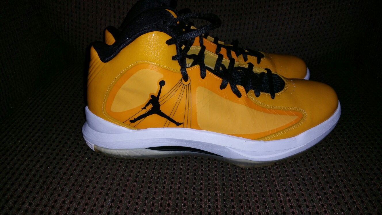 Air Jordan black and yellow shoes