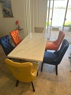 Dinning table with 6 suede chairs