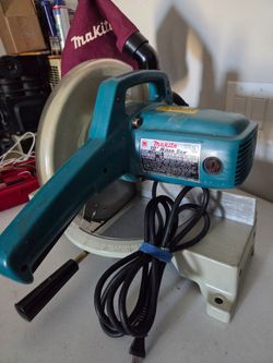 Vintage Makita LS1030 10-inch compound miter saw in teal