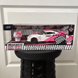 Jada hello kitty R35 Nissan GTR figure and diecast car - sealed in box