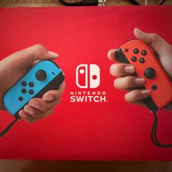 Nintendo Switch With Neon Blue And Neon Red Joy-Con