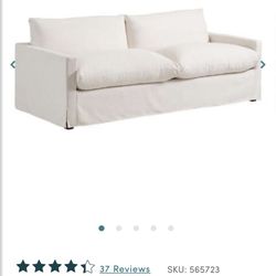 Like New-Modern cream machine washable feather filled sofa