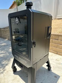 Pit Boss vertical smoker (works. Excellent)