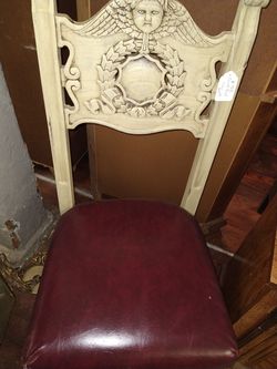 Angel carved chair
