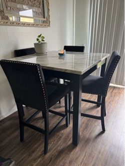Dinning table - faux marble 4 black suede chairs