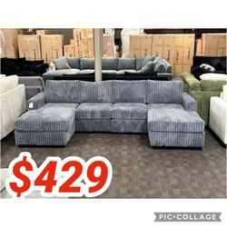 Dark gray jumbo corduroy double chaise sectional sofa  118"W X 59"D X 34"H 