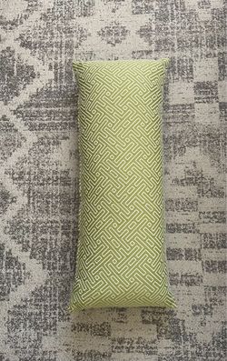 Bright green lumbar pillow geometric