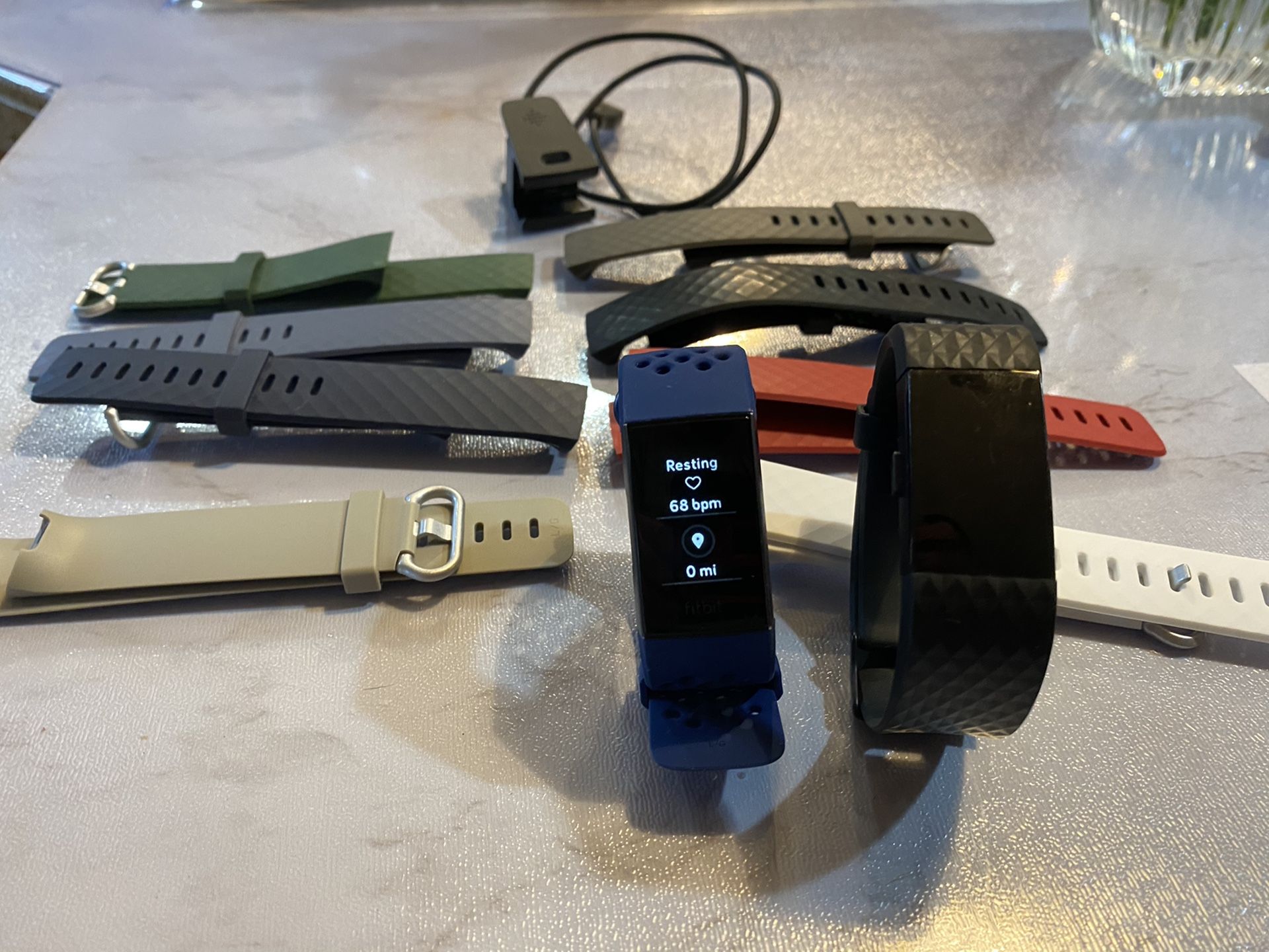 Fit bits- Charge 3 and Charge 2 plus eight wristbands