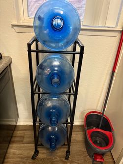 Water cart holds 4 gallons