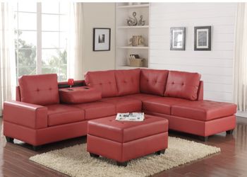 RED BONDED LEATHER SECTIONAL SOFA WITH OTTOMAN AND CUP HOLDERS NEW