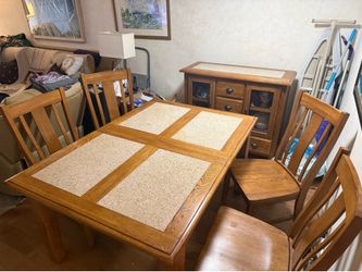 Solid oak and marble table with chairs and buffet