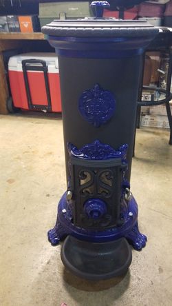 Miniature godin wood burner.