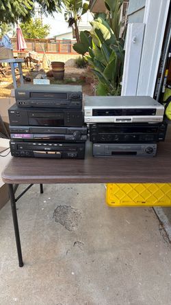 Lot of VCR, DVD, and AV Players