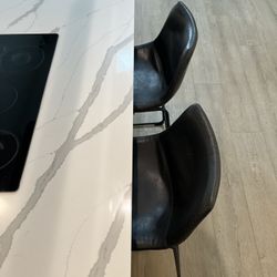 Two Stylish Gray Leather Barstools – High-End Look, Priced to Move!