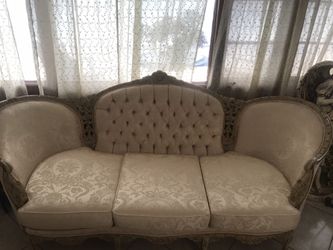 antique sofa and chairs with table