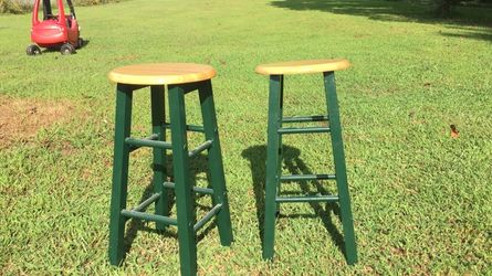 Two 24" metal and wood bar stools