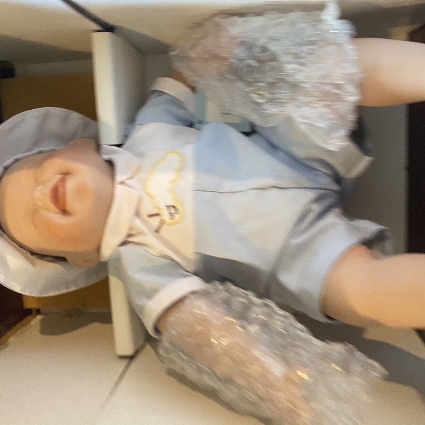 Porcelain Baby Doll “Tickles”