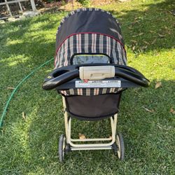 Foldable baby stroller