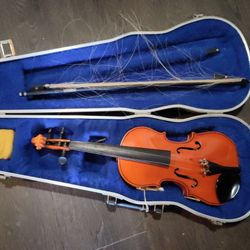 Child size violin and case

