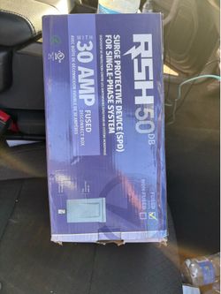 Disconnect with surge protector