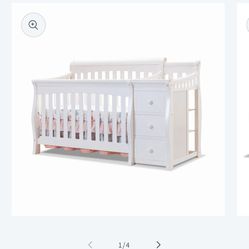 White Sorelle Princeton Baby Crib With Bed.