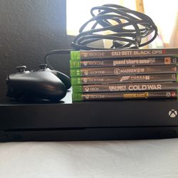 Microsoft Xbox One X 1TB Console Black W/ Games