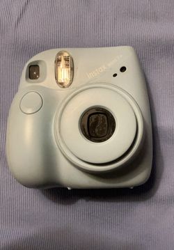 Light blue Polaroid camera instant 7