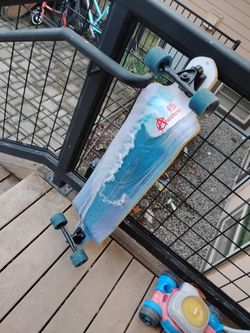 Awaken surf wave drop down complete longboard